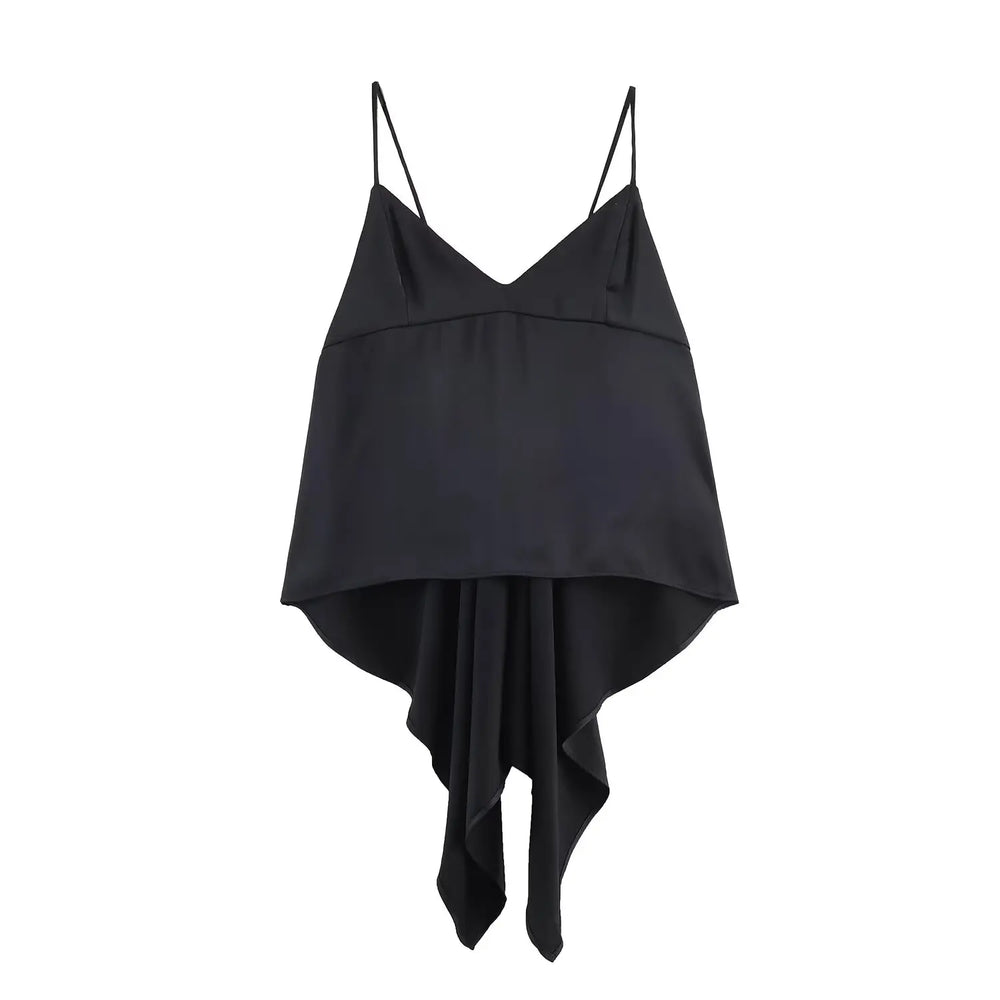 Black slip dress with draped front on a white background