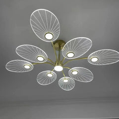  Close-up of the chandelier, showcasing the intricate lotus leaf details and warm LED glow. Golden Atelier 4