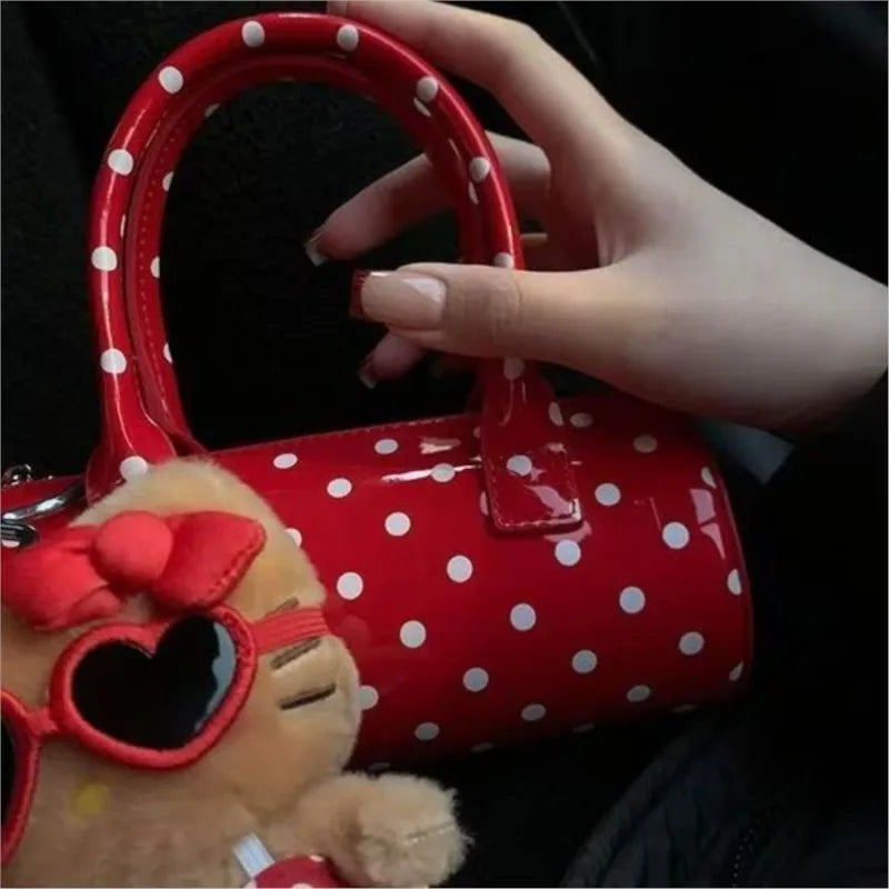 Red polka dot cylinder handbag