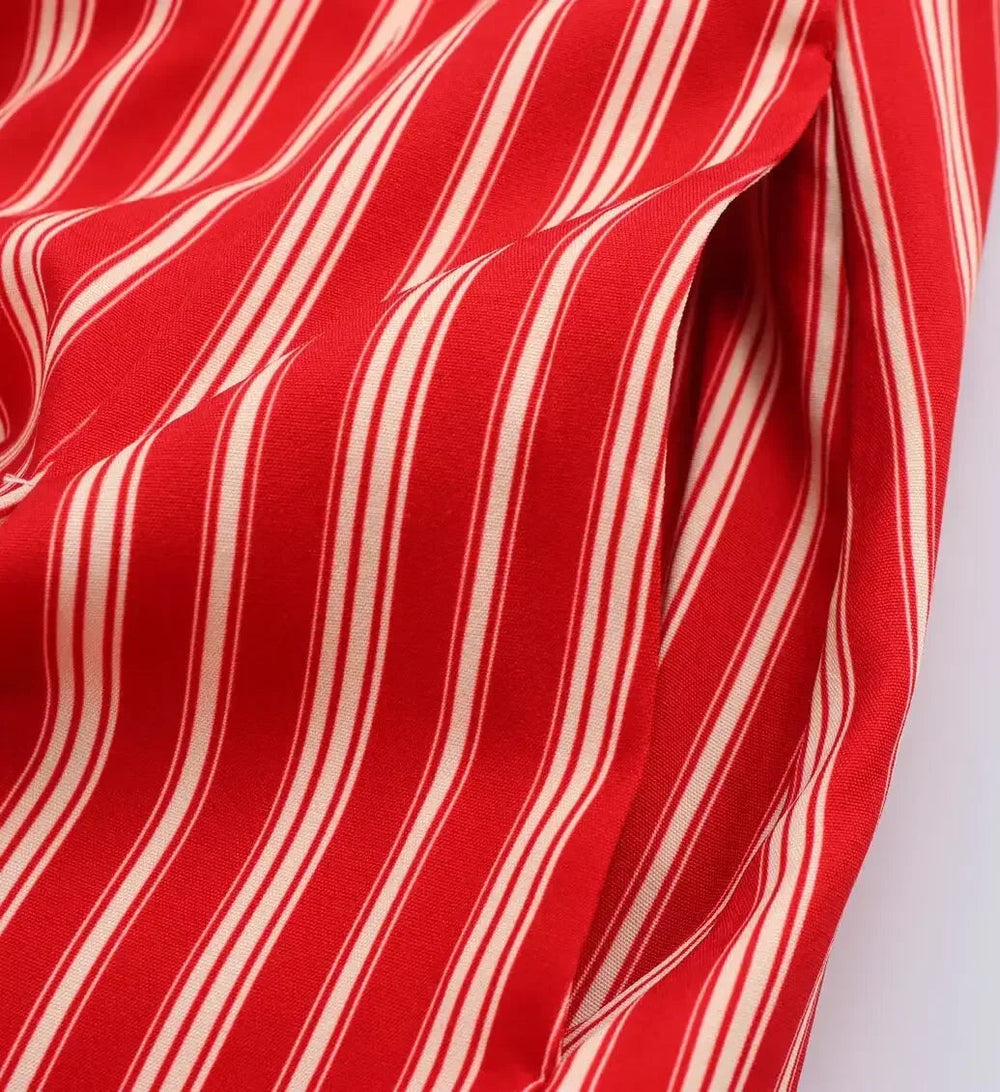 Red and white striped fabric on a white background