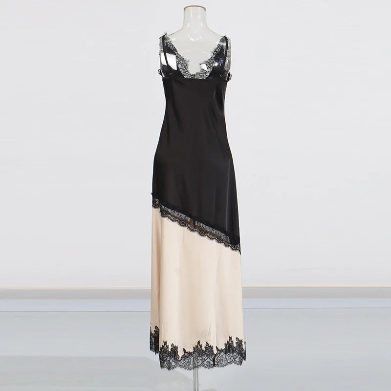 Black and beige dress with lace details on a mannequin