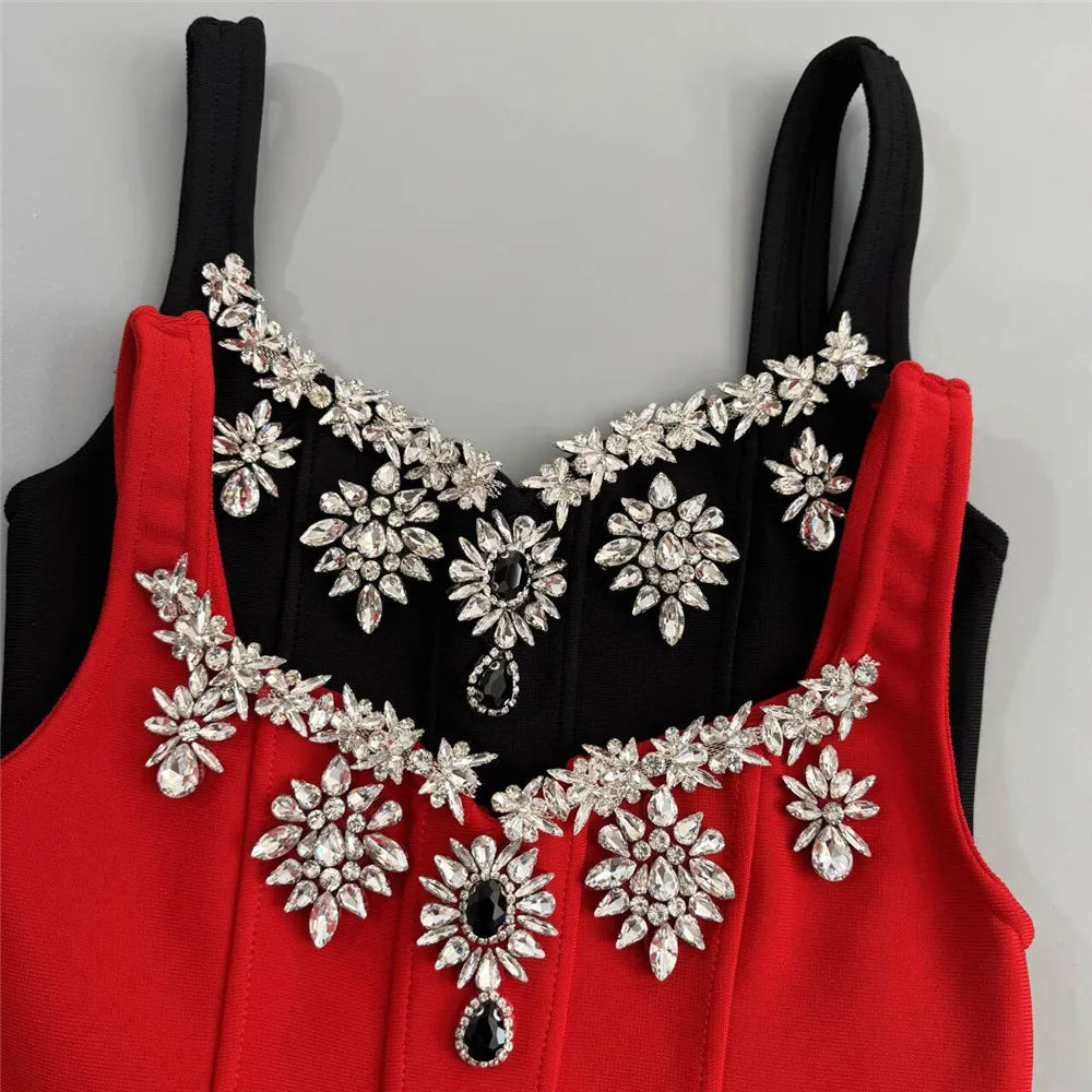 Close-up of crystal embellishment on black mini dress