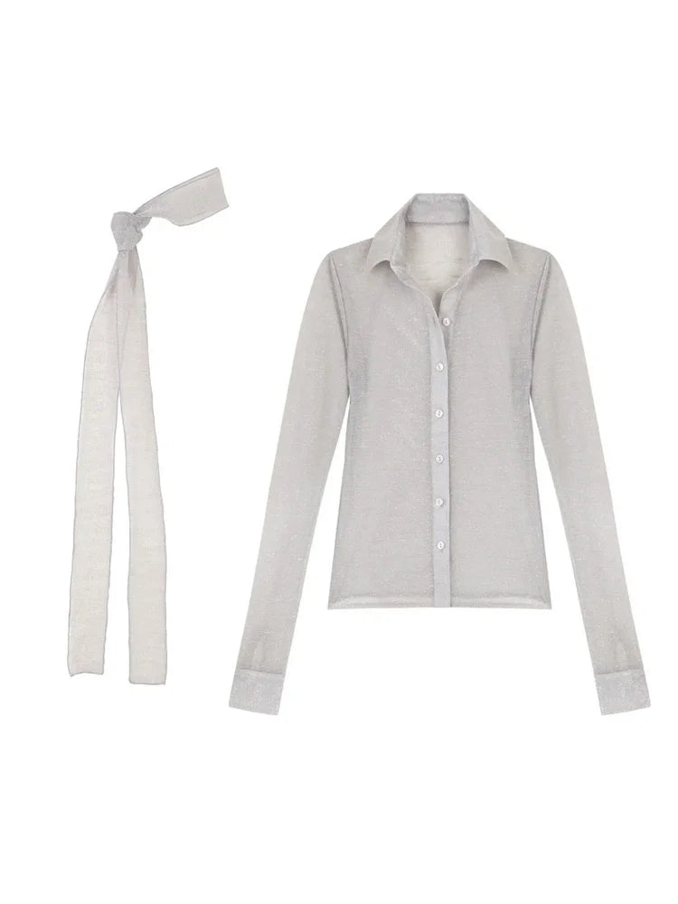 Light gray shirt with a tie on a white background