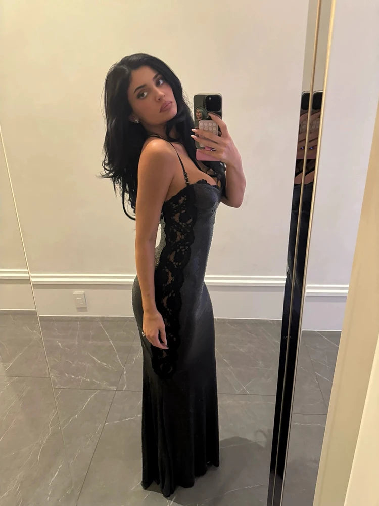 Mirror selfie of black lace spaghetti strap maxi dress