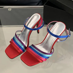 Close-up of multi-strap stiletto heel sandal in red