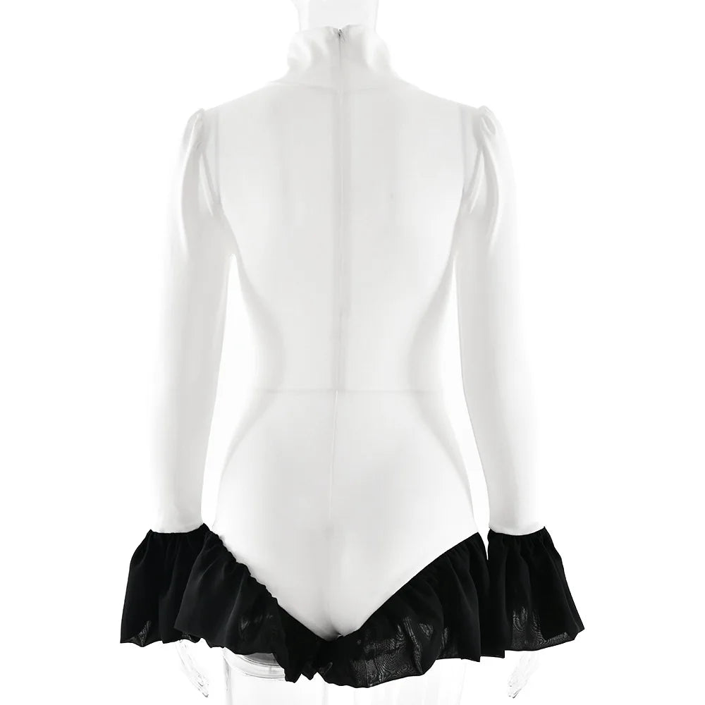 White leotard with black ruffle bottom on a white background