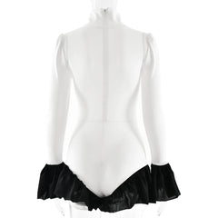 White leotard with black ruffle bottom on a white background