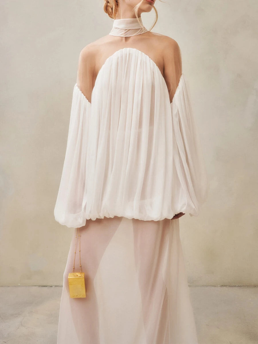 Back view of white gathered off-shoulder balloon sleeve top