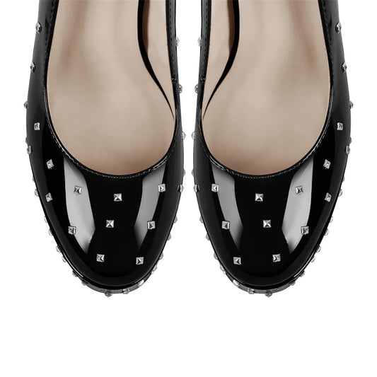 Top view of black studded patent leather pointed toe heels