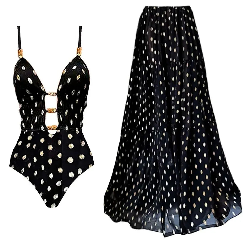 Black and gold polka dot bikini and matching maxi skirt laid out