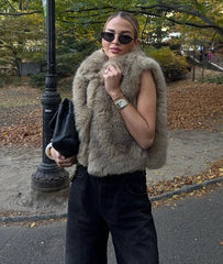 Faux fur vest with a loose fit.