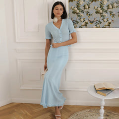 Stylish knitted V-neck short set with hollow-out details.
