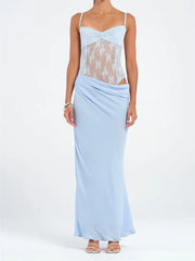 Light blue dress with lace detailing on a white background