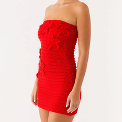 Red strapless dress with floral details on a white background