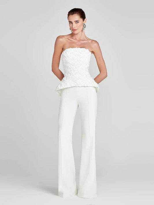 Strapless floral textured top styled with wide leg pants
