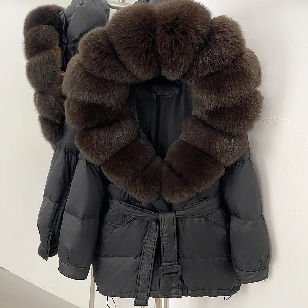 Dark gray puffer coat with large brown fur collar