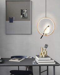  Nordic bird pendant lamp with black and silver finish, hanging in a cozy  Study room setting. Golden Atelier 4