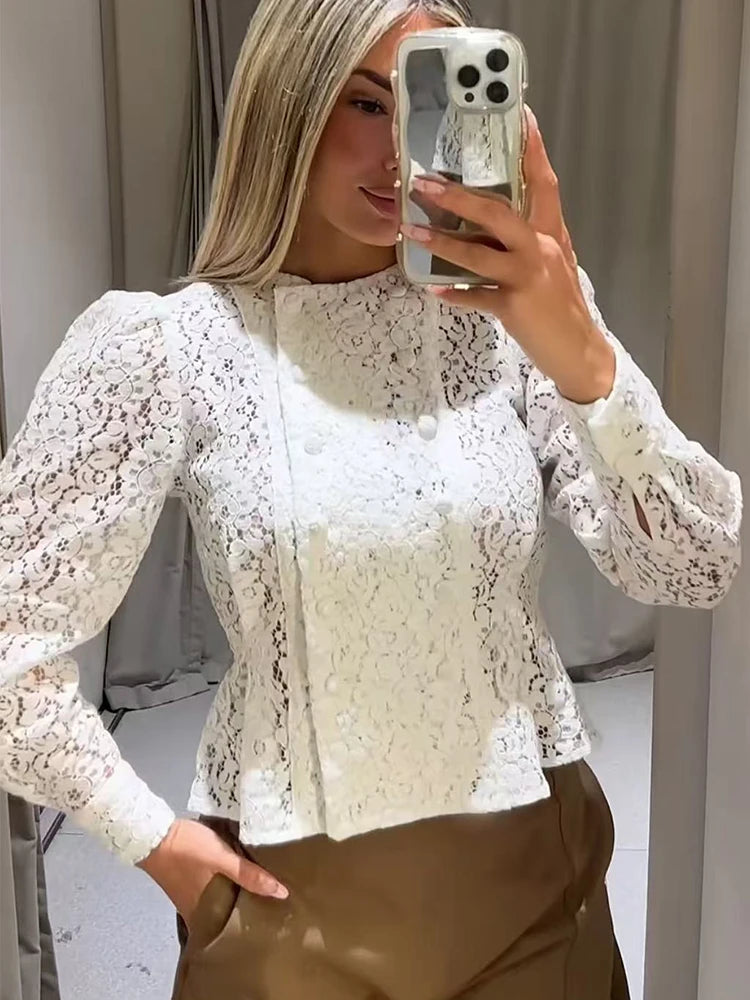 Lace double-breasted cropped jacket worn by a model.