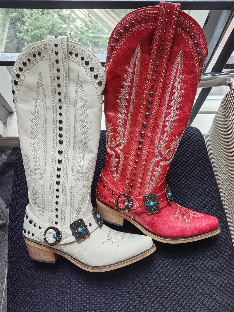 Pair of white and red embroidery buckle knee high boots