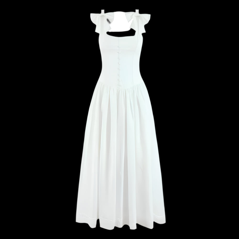White dress with bow straps on a black background