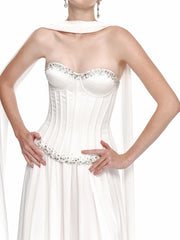 Close-up of strapless corset top with crystal embellishments