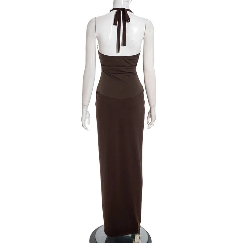 Brown evening gown on a mannequin against a white background