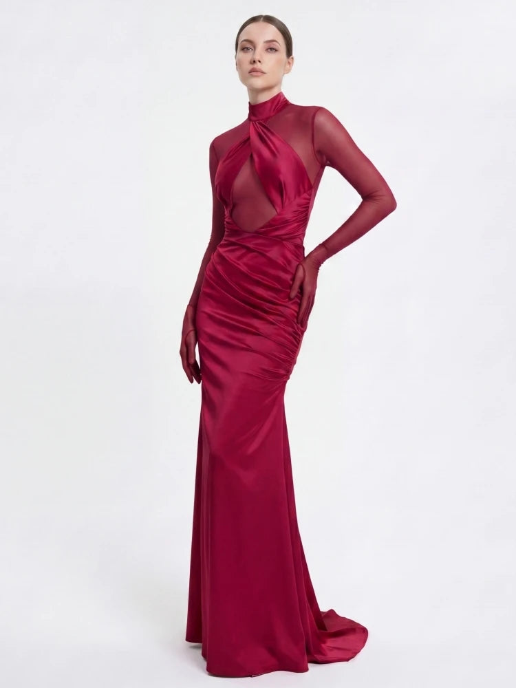 Full length view of a claret gown with a high neck and ruched effect