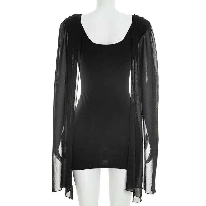 Black dress with sheer sleeves on a mannequin against a white background