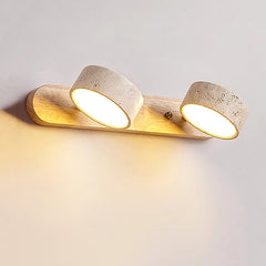 Modern wall light fixture with two bulbs on a neutral background