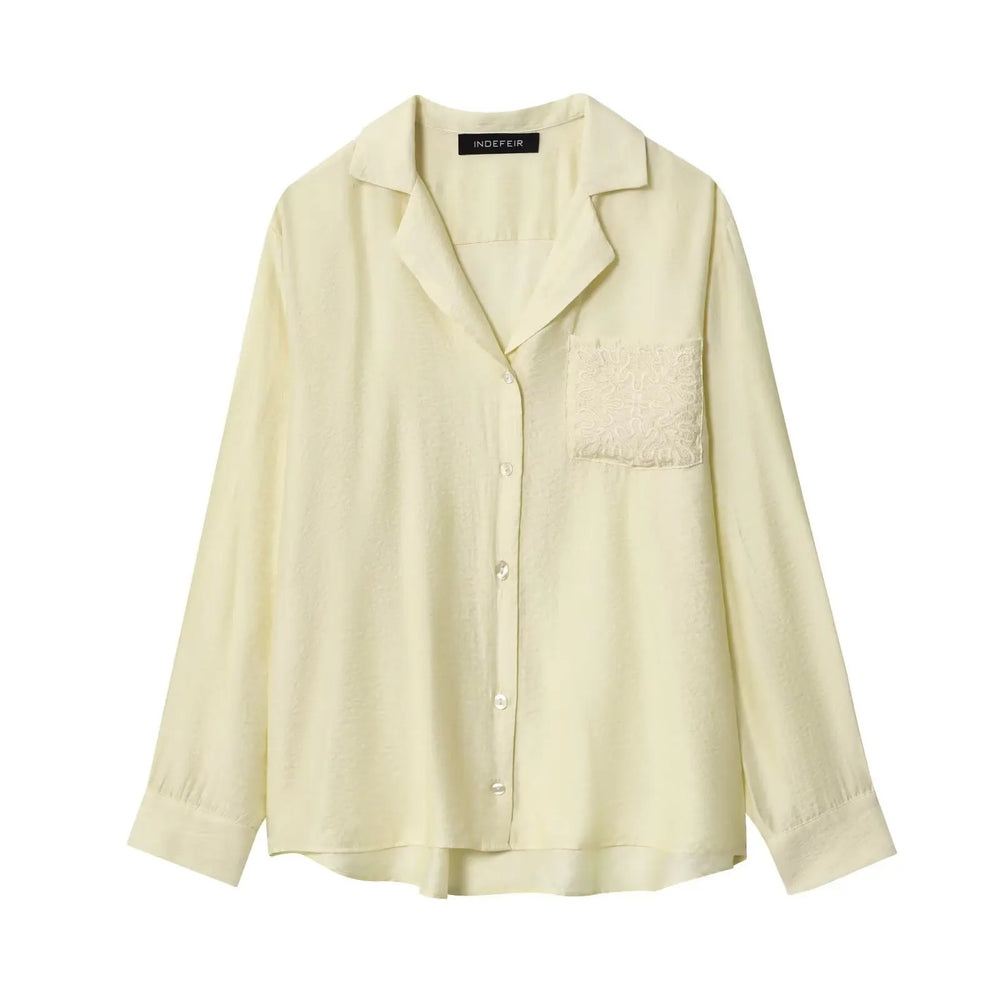 Light yellow shirt on a white background