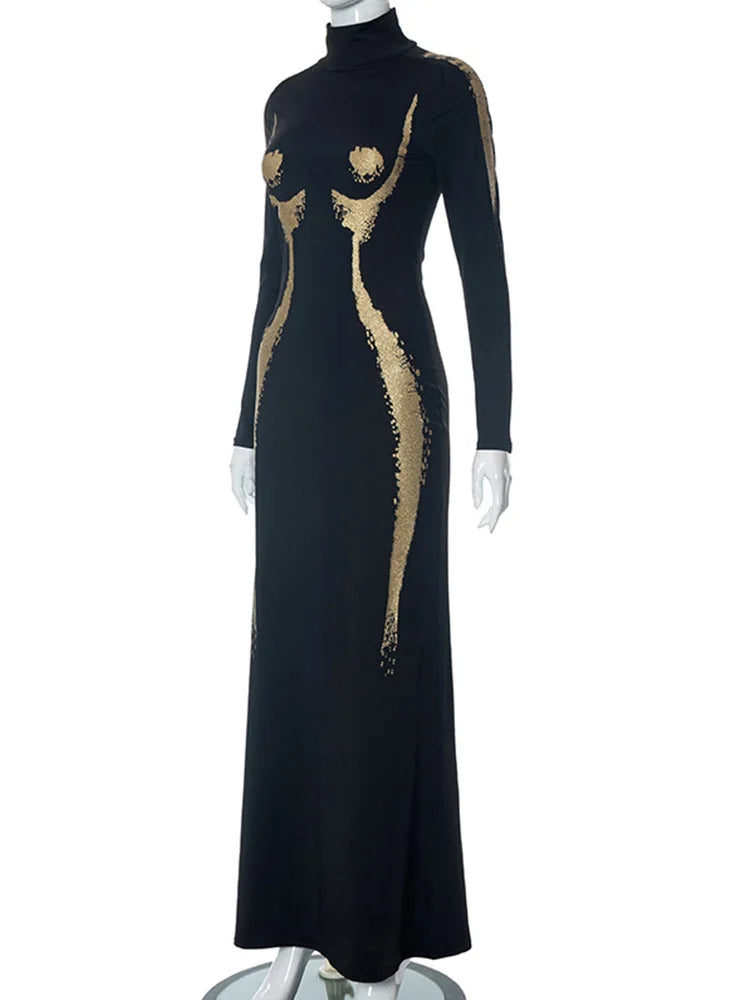 Black dress with gold abstract patterns on a white background