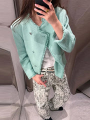 Textured cropped top with frayed collar and button front