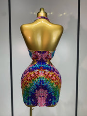 Back view of a halter neck mini dress with rainbow diamond embellishments