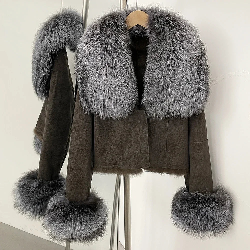 Brown coat with gray fur trim on a hanger against a white background