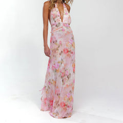 Woman wearing a floral pink dress on a white background