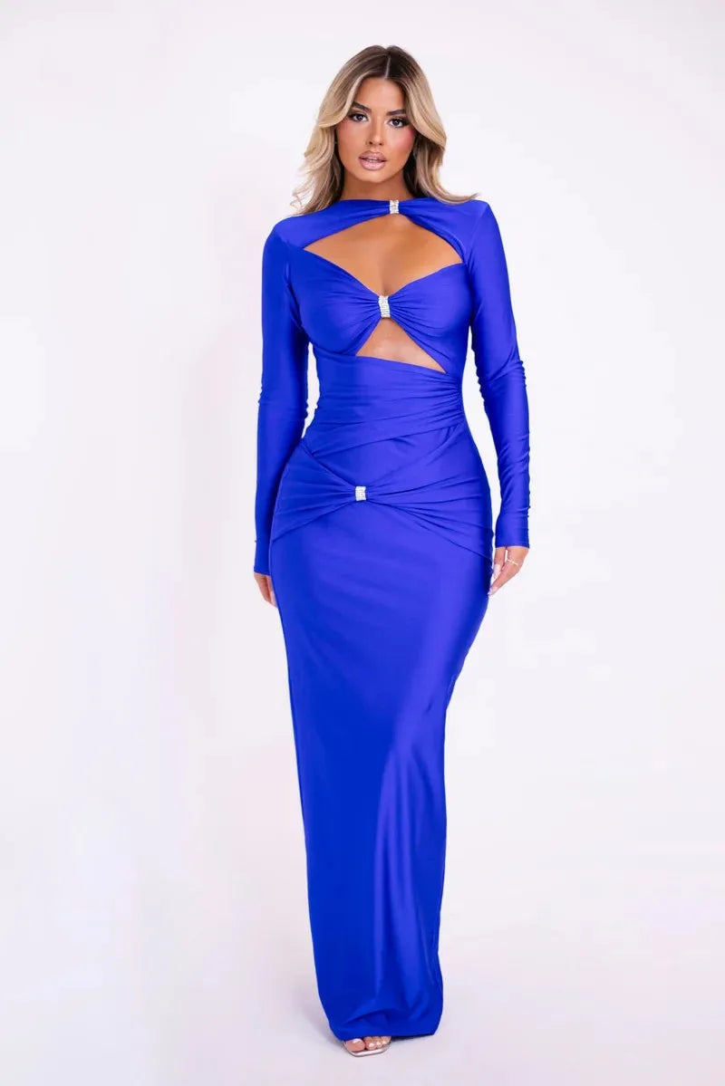 Woman wearing a blue evening gown with cut-out design on a white background