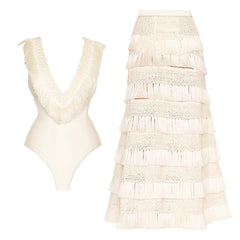 Fringed swimsuit and matching skirt displayed separately