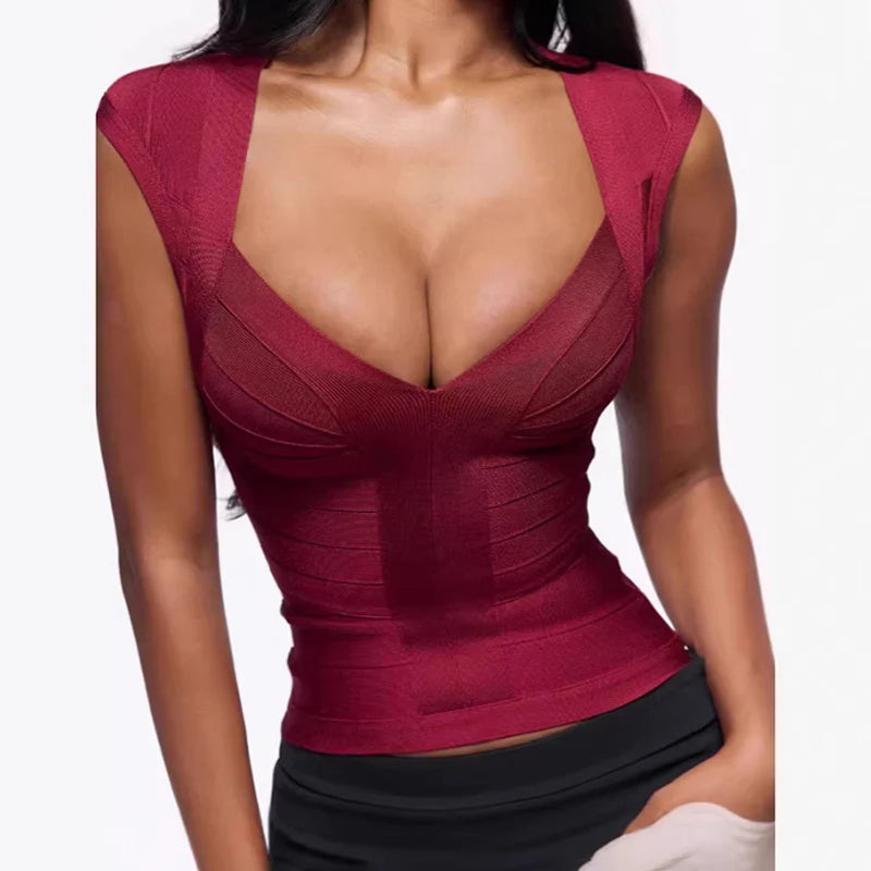Red corset top worn by a person on a white background