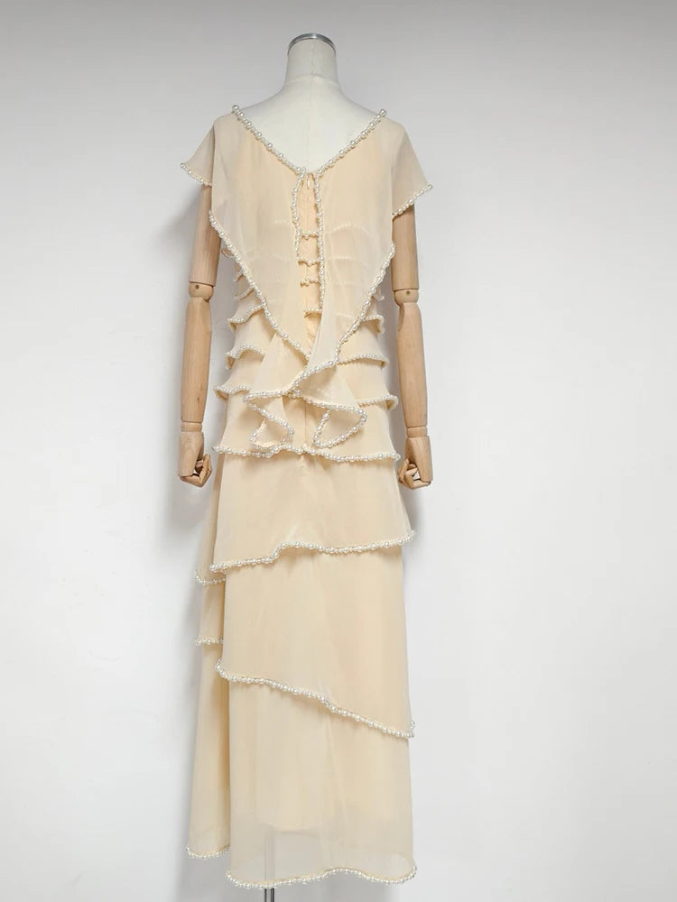 Off shoulder pearl trim maxi dress on mannequin