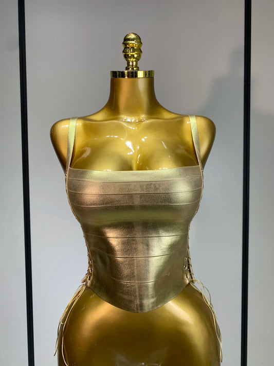 Gold bandage corset top with lace-up back detail