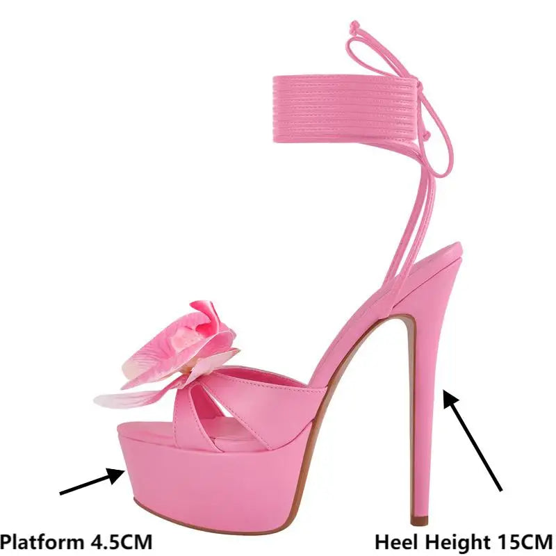 Side profile of pink platform stiletto sandals with heel and platform measurements