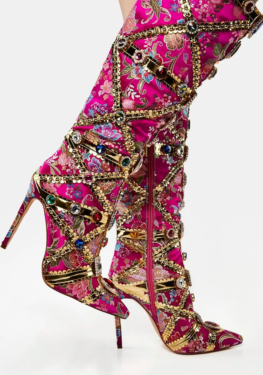 Decorative high-heeled shoes with floral pattern and gold embellishments