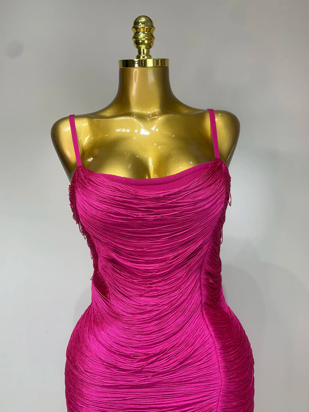 Close-up of ruched bodice on midi dress