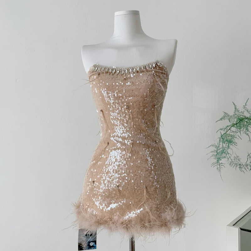 Strapless sequin mini dress with feather trim, front view