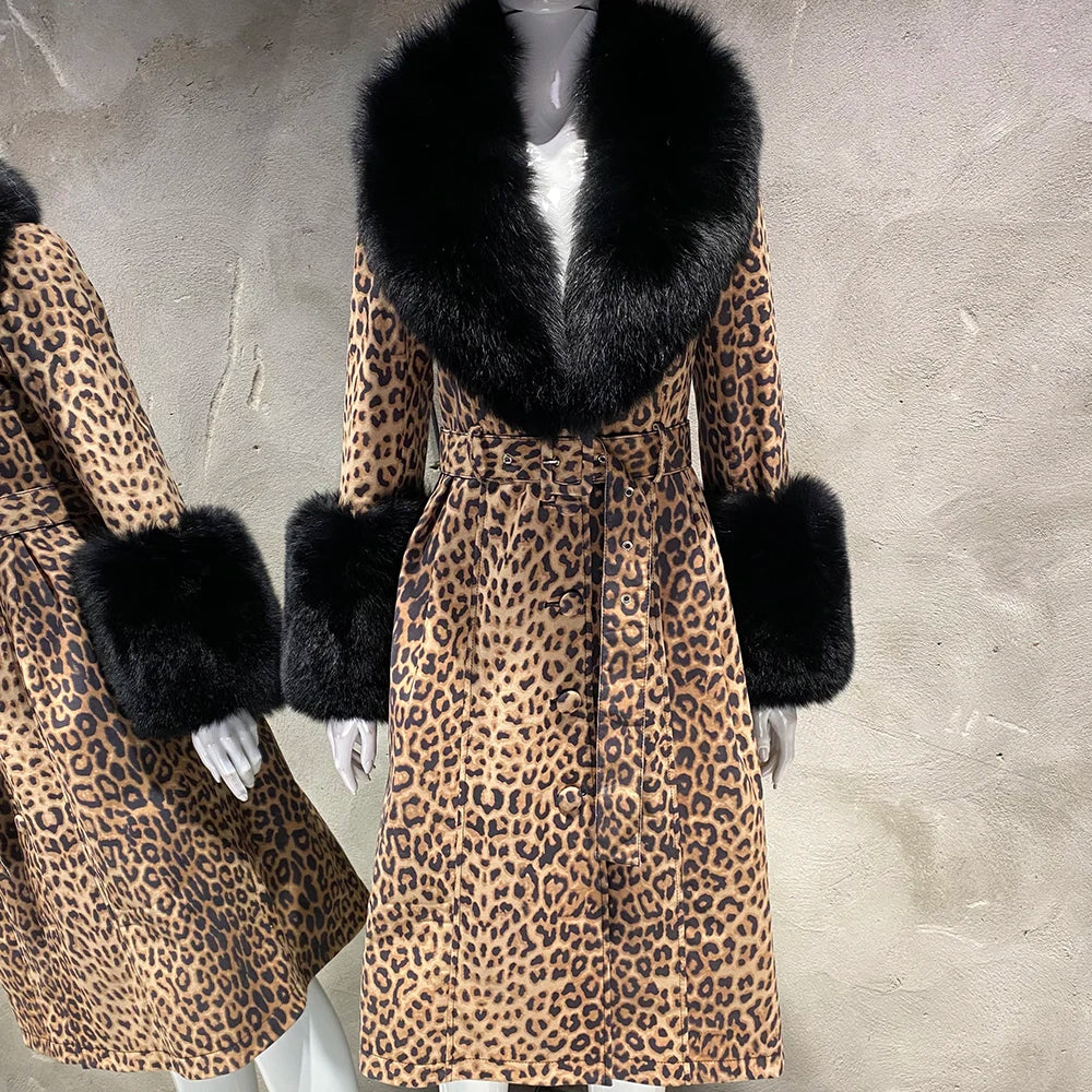 Leopard print coat with black fur trim on a mannequin against a gray background