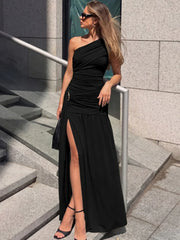 Black one shoulder draped maxi dress outdoor