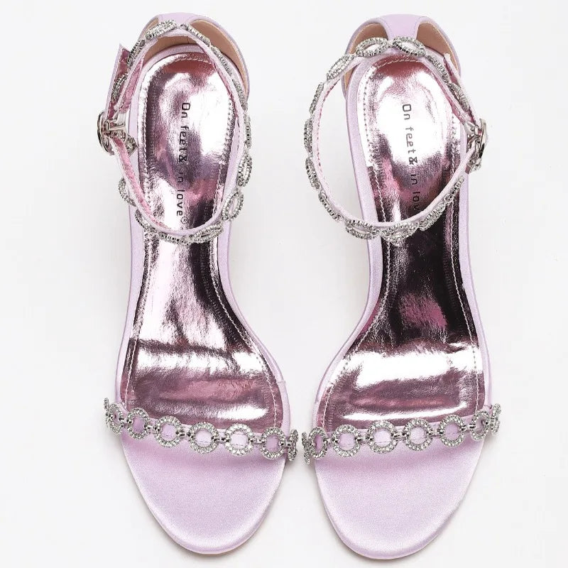 Top view of purple crystal chain ankle strap stiletto heels