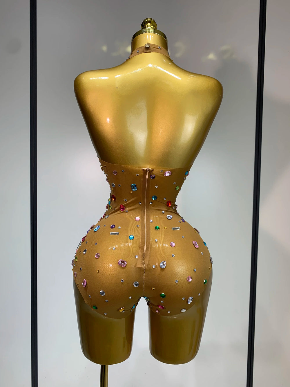 Back view of mesh bodysuit