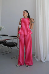 Rose Red striped peplum top and wide leg pants set pose