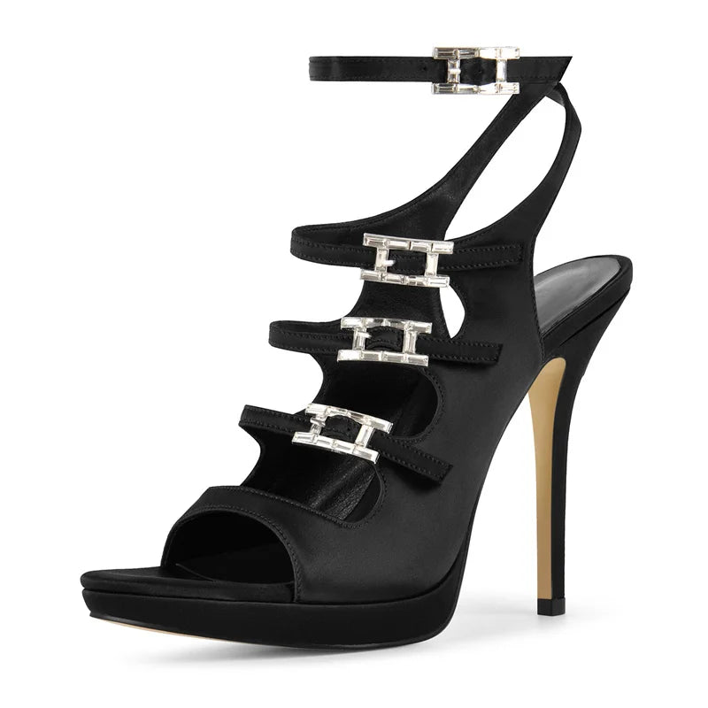 Black satin multi-strap stiletto sandals with peep toe and ankle buckle